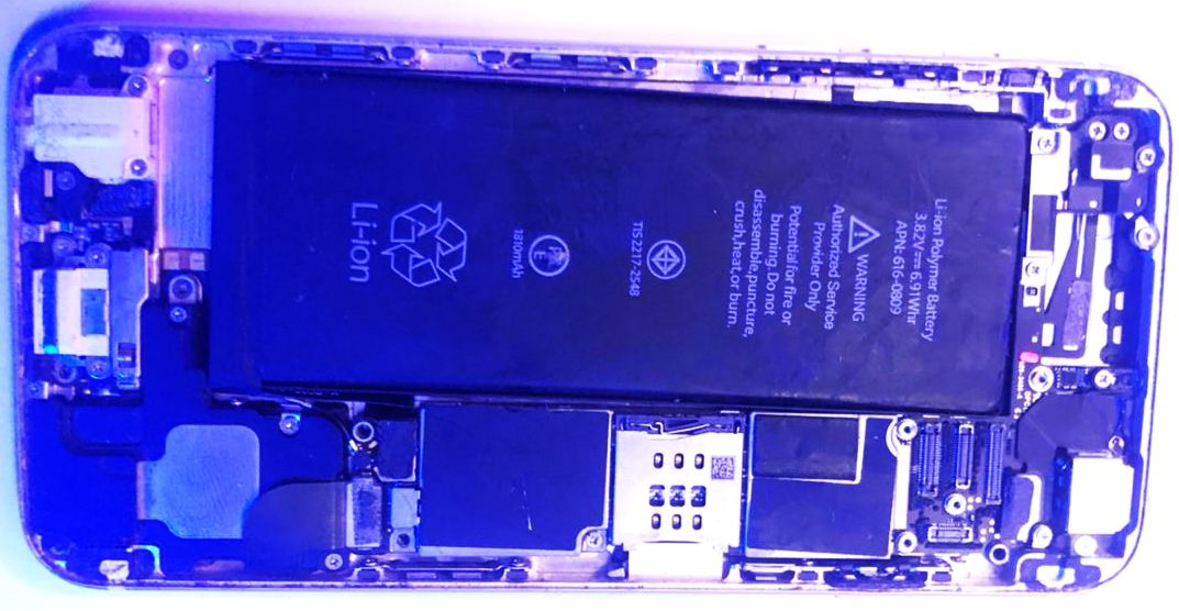 An opened phone with the motherboard visible